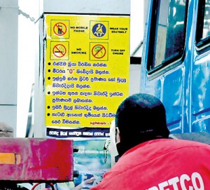 Larger than life posters warn customers of the dos and don’ts at fuel stations