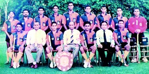The NCC hockey team Pioneer Shield winners in 1994-1995. Amitha, the skipper is seated fifth from left.  - Pics by Indika Handuwela