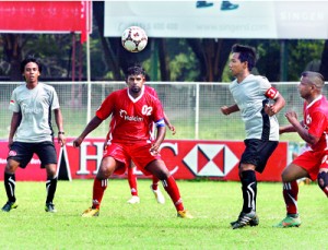 Masons from Sri Lanka and Indonesia playing during a football tournament organised by Holcim Lanka. This category of workers from Sri Lanka joined their colleagues from Indonesia for the annual Holcim Masons' Asia Cup held recently in Colombo. The team from Indonesia won the trophy for the second consecutive year.
