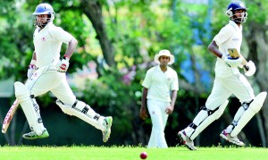 Sachith Pathirana (L) and Angelo Jayasinghe (R) shared a partnership of 163 runs for the second wicket to help Chilaw Marians score 256 vs NCC who declared at 405-6. - Pix by Amila Gamage