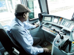 Nimal Perera at the controls of the Swiss Railways locomotive.Photo: Brigitta Franchetti