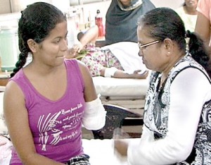 Achala with her mother last  week in hospital