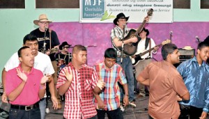 The children having the time of their lives to the music of The Mavericks (above) and Bob Livingstone (right).