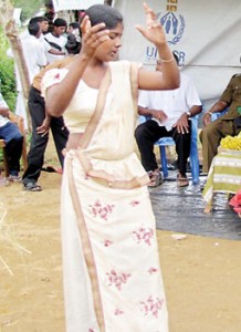 A gypsy woman dances at the event in Nochchkulam