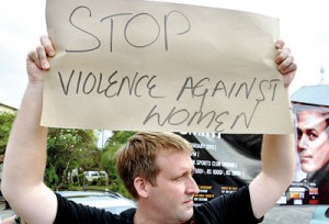 As  part of the ‘one billion rising’ global campaign to raise awareness over crimes against women held on February 14, a protest was held at  Lipton’s Circus in Colombo. Here a foreigner is seen doing his bit.  Pic by Amila Gamage