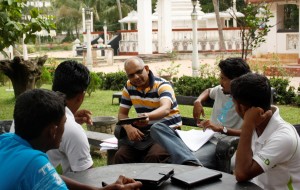 Harsha Liyanage with a group of people