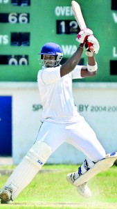 Thilina Silva of St.Benedicts square cuts on his way to hit 75