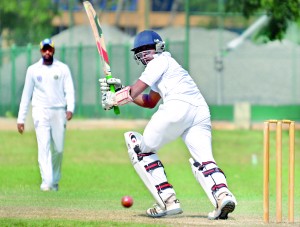 Bloomfield opener Dilshan Munaweera works the ball towards fine leg against Lankan CC at Reid Avenue. - Pic by Amila Gamage