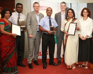 ICBT Campus staff proudly posing with awards together with British Council officials