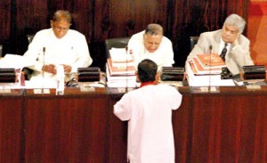 Govt. has no respect for Constitutional rule: Wickremesinghe (right) in Parliament
