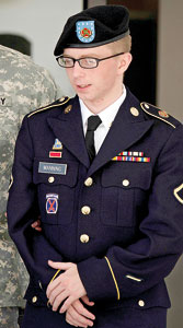 Bradley Manning is escorted by military police as he departs the courtroom at Fort Meade, Maryland in this April 25, 2012 file photo. AFP