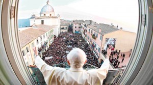 Pope Benedict XVI waves as he appears for the last time at the balcony of his summer residence in Castelgandolfo (Reuters)