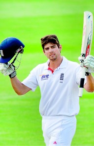 England's captain Alastair Cook celebrates 100 runs during day four of the first international cricket Test match against New Zealand at the University Oval park in Dunedin. - AFP