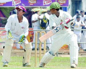 St. Sebastian’s opener Avishka Fernando makes quick runs on his way  to become the top scorer of the 63rd Battle of the Golds encounter at Moratuwa. 					- Pic by Ranjith Perera