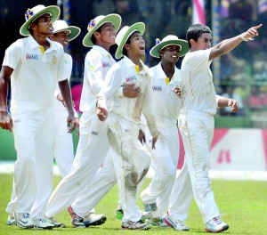 The victotious Royal cricketers greeting their fans after beating S. Thomas’ by 7 wickets in the 134th Battle of the Blues.