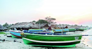 Boats lie idle on Karainagar beach to mark “turn naal”—or turn day.