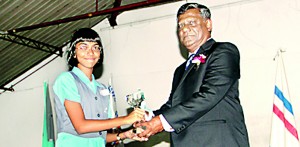 Lyceum Nugegoda Scrabble captain Sewmini Pieris�receiving the Overall Runners-up Trophy.