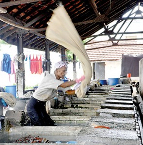 Line after line of clothes blowing  in the wind. Pic by Indika Handuwala