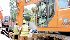 Residents say use of the heavy machinery  (pictured) has caused walls of houses to crack and in some instances led to foundations of houses breaking.