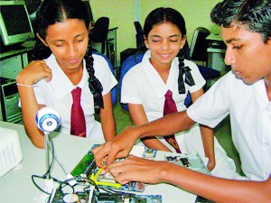 Students under an ICT practical