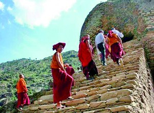 A group of monks from Bhutan visit an archaeological site to offer their religious rituals in Pakistan's northwestern Swat Valley (AFP)