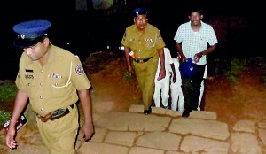 Police leading the students to the Police station