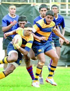 A Royal player tries to make a breakthrough - Pic by Ranjith Perera