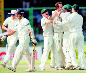 Nathan Lyon sends back legendary Sachin Tendulkar.