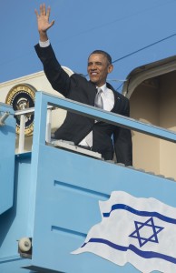 Obama waves from the steps of Air Force One prior to departing from Ben Gurion International Airport in Tel Aviv. AFP