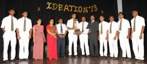 Royal College team together with the Chief Guest at the event Dr. Ajith Dissanayake, Head of Economics, University of Kelaniya; Guest of Honour, Mr. Aruna Alwis, Secretary/CEO - CA Sri Lanka; Principal Devi Balika Vidyalaya, Cornel Mrs. W. D. P. J Samarasinghe; and Commerce Sectional Head of Devi Balika Vidyalaya, Ms. Irene Kulathunga.