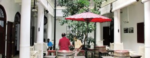 A place to gather and relax: The courtyard and below right, the restaurant