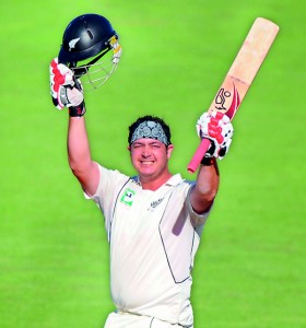 In this file picture taken on April 2, 2009 New Zealand cricketer Jesse Ryder celebrates after scoring a century during the first day of the second Test match at the McLean Park in Napier. Battered New Zealand cricketer Jesse Ryder was showing signs of improvement on March 29, 2013 and gave family the thumbs-up as police charged a man with assaulting the gifted batsman in a savage beating. AFP