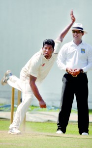 Moor's bowler Dilhara Lokuhettige in action. Pic by Ranjith Perera