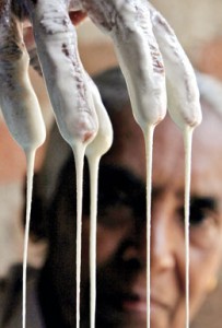 Just the right touch: Mixture flows down in the intricate process of  making aasmi