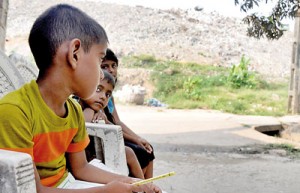 Students find it difficult to concentrate  on their studies amidst the garbage