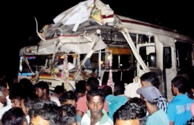 25 injured in bus-train collision at unprotected crossing