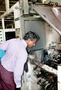 A Govt. Analyst Dept official along with policemen inspect the damage in the latest attack. Pix by T. Premananth