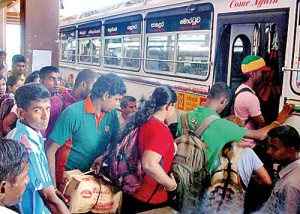 "I'm getting into this bus somehow" a foreign tourist scrambles to get into a bus