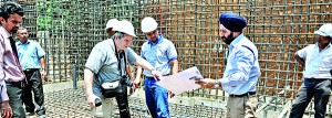 Here officials inspect the construction of Sri Lanka's first TomoTherapy unit. From left - Messrs K. Senadeera -Senior Assistant Manager Projects of Ceylinco Life, Valeri Zassedatel - Project Manager Tomotherapy Inc, Belgium, Sithira Narasinghe - Technical Service Manager DIMO (Pvt.) Ltd, Jagmeet Singh - Technical Support Manager Accuray Medical Equipment (India) Pvt. Ltd, and W. M. Rathnasinghe- Resident Engineer Ceylinco Life.