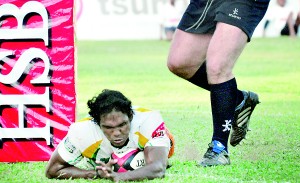 Fazil Marija scoring his third try of the A5N, against Kazakhstan. All of his three tries interestingly came via interceptions. 	            - Pix by Amila Gamage.