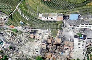 An aerial view shows houses damaged after a strong earthquake in Lushan county, Ya'an, Sichuan province (REUTERS)