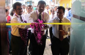 The opening ceremony of Laugfs Capital Limited was held recently at Kohuwala. Here W K H Wegapitiya, Chairman and U K Thilak De Silva   - Managing Director together with Mayura Fernando,  Director/ Chief Executive Officer and Sudath Jayawardhana, Director/ General Manager at the ceremony.