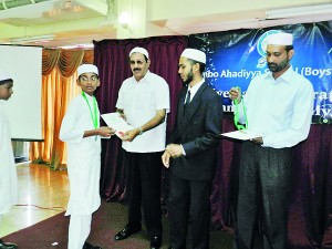 student receiving certificate from ITN Director Hashim Omar copy