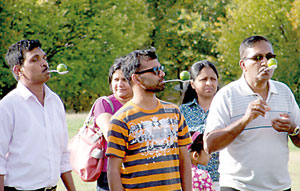 Some adults get to show off their skills at the Avurudu festivities in Canberra