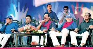 A tired President Mahinda Rajapaksa with other grim faced SLFP stalwarts at Campbell Park. Pic by Amila Gamage