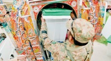 Pakistan votes in landmark polls, attacks kill 18