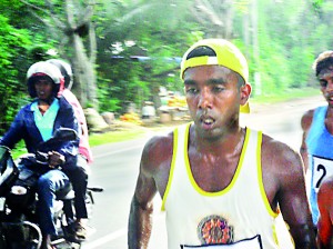 Asela Bandara the winner of the half marathon at the half way mark
