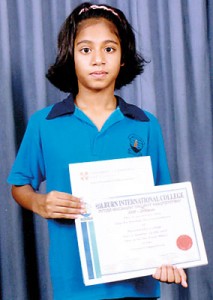 Imasha Weerawardana,  11 years, a student of  Hilburn International College, Avissawella received  certificates for First Place in Drama Competition at the Inter Hilburn Talent Competition and for Cambridge ESOL Examination (KET).