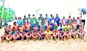 The participants and with guests and officials before the swim