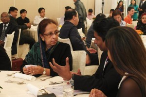 Seen here Ms. Ferial Ashroff in conversation at the Singapore event.